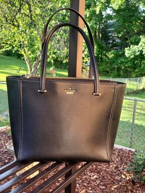 kate spade black leather tote with gold logo